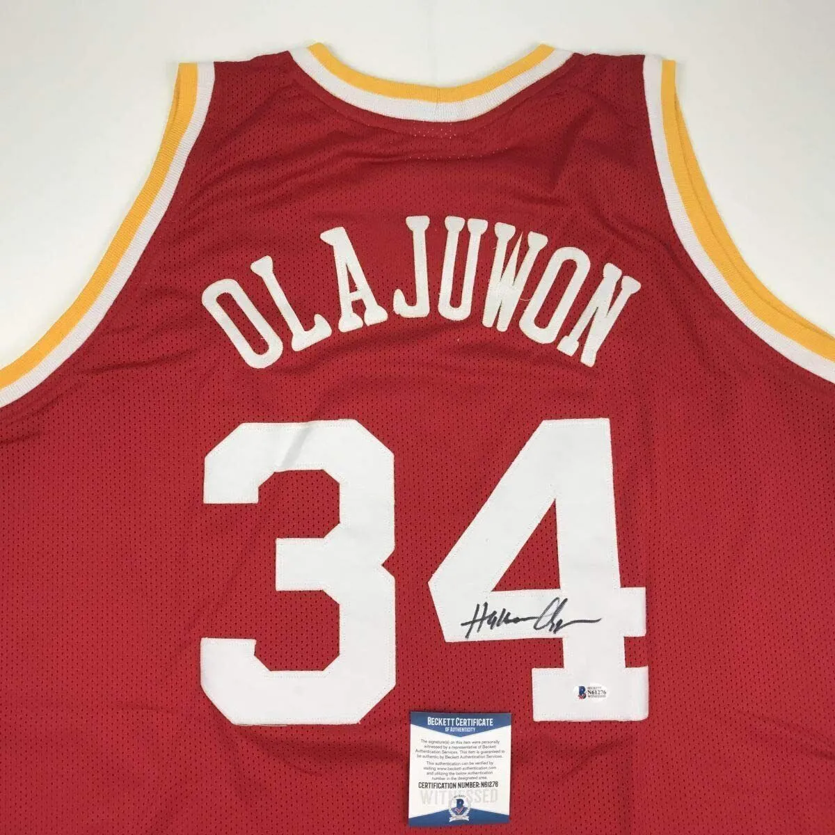 Autographed/Signed Hakeem Olajuwon Houston Red Basketball Jersey Beckett COA
