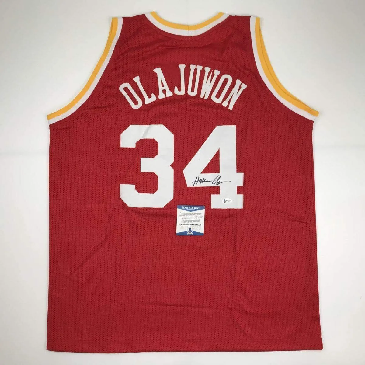 Autographed/Signed Hakeem Olajuwon Houston Red Basketball Jersey Beckett COA